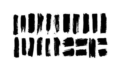 Collection of Black Brush Strokes and Paint Splatters on White Background