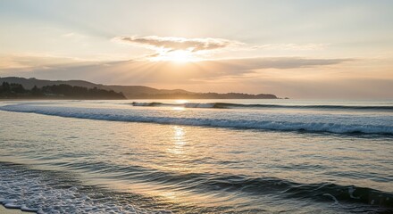 Obraz premium Sunset over ocean waves