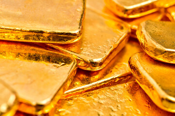 Close up photo a gold bars background