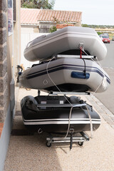 Inflatable boats display shop sell rubber dinghy store on street harbor