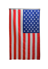 Obraz premium A vertical US flag with its red and white stripes and blue canton with stars hanging against a white background.