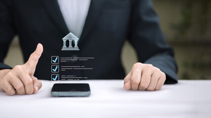 Businessman Touching Digital Government Building with Checklist