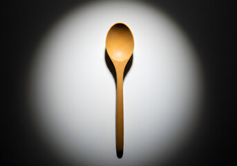 Wooden spoon overhead shot simple cooking utensil isolated