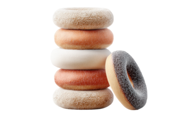 Stack of classic frosted and plain donuts against black background, cut out