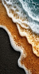 Foamy waves on a sandy beach