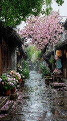 A tranquil, rain-soaked cobblestone alleyway is framed by aged buildings and vibrant pink blossoms, creating a serene and picturesque scene