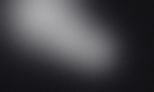 A gradient of light and shadow creating a soft and blurred effect with a dark and light contrast area