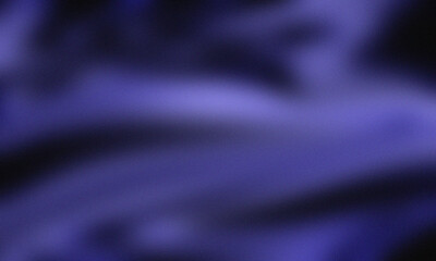 Abstract blurred background featuring shades of purple and black creating a soft and dreamy effect