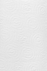 Close-up of a roll of white paper with a distinctive non-standard texture.