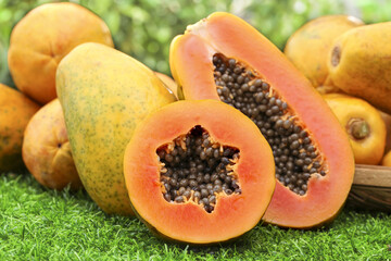 Fresh Hainan Red Heart Papaya Fruits Cut Open Showing Juicy Orange Flesh and Seeds