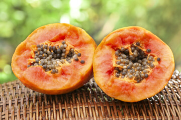 Fresh Red Papaya Fruit Halves from Hainan Leizhou China Showing Seeds and Flesh