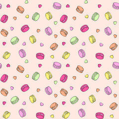 Cute seamless pattern with colorful hand-drawn macarons and hearts. Sweet pastry dessert background in pastel colors. Fun food illustration for confectionery, cafe menu, or fabric print.
