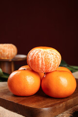 Fresh Bergamot Citrus Fruits from Guangxi China on Wooden Board with Peeled Segments