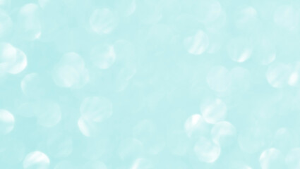 Blue green turquoise bokeh texture background. Concept for Winter season, Snowfall, New Year, Christmas and All Celebrations.
