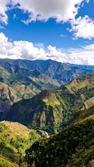 Naklejka premium Mountainous landscape with vibrant greenery