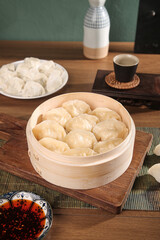Traditional Handmade Seafood Dumplings in Bamboo Steamer Basket Asian Cuisine