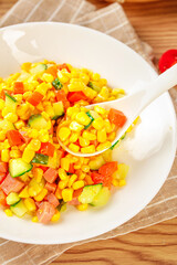 Fresh Gourmet Corn Kernel Salad with Mixed Vegetables in White Bowl