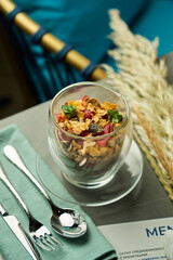 Layered chia pudding with berries and cereal