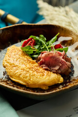 omelet with roast beef and greens