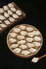 Traditional Spanish Seafood Dumplings with Mackerel on Wooden Bamboo Steamer