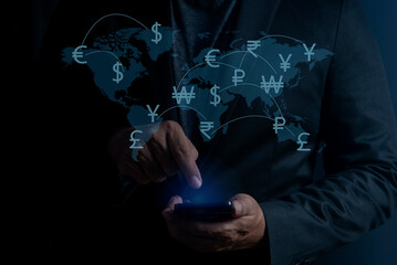 Man using smartphone with online financial transactions for overseas spending. Financial and investment concept. money transfer and exchange, global currency concepts.