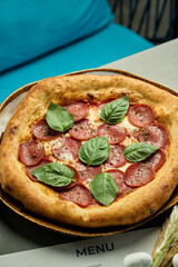 close up of pepperoni pizza on table