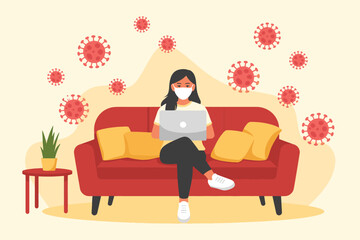 Woman working from home during pandemic wearing mask with laptop