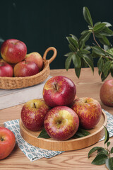 Fresh Red Fuji Apples from Daliangshan on Wooden Board - Organic Fruit Still Life