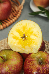 Fresh Red Fuji Apples Sliced Half Yellow Flesh Seeds Wicker Basket Healthy Organic Fruit