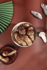 Fresh Wild Mushrooms in Bowls on Terracotta Background - Natural Organic Cooking Ingredients