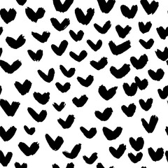 Charming black hand-drawn hearts scattered across a clean white canvas create a modern, versatile pattern perfect for any romantic design project.