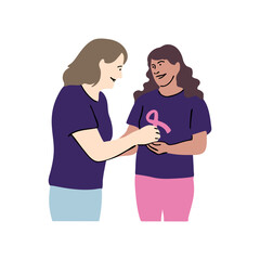 Two smiling women in purple shirts, one with pink ribbon, supporting breast cancer awareness and showing compassion, standing face to face