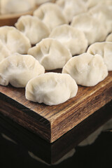 Large Traditional Handmade Spanish Mackerel Dumplings on Wooden Board