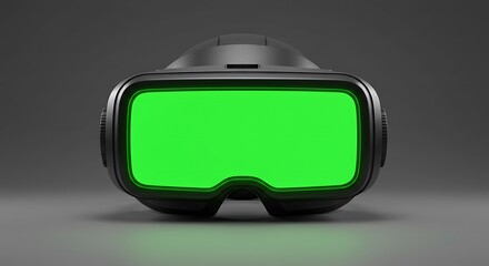 Advanced virtual reality goggles with an illuminated green screen display, isolated on a grey surface, representing metaverse technology and innovation