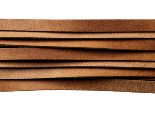 Rich, warm leather strips stacked in varying shades of brown, showcasing natural texture and luxurious quality for crafting, fashion, or design projects.