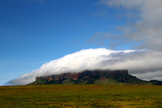 Photo of Platberg covered in clouds in the vicinity of Harrismith, an Eastern Free State town situated on the N3 main route between Gauteng and KwaZulu-Natal. The N5 national road to and from WinburgI