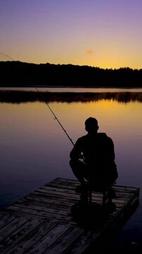 fishing on the lake at sunset 