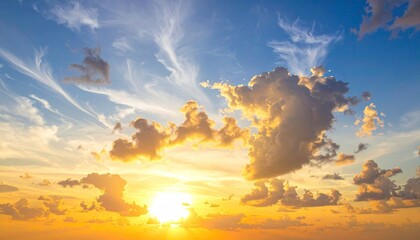 Obraz premium Majestic Sky with Golden Clouds at Sunset Beautiful Sky Landscape of Sunlit Clouds in a Serene Horizon Wide Angle Aerial View Golden Light