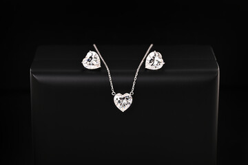 A set of diamond jewelry including a necklace and earrings
