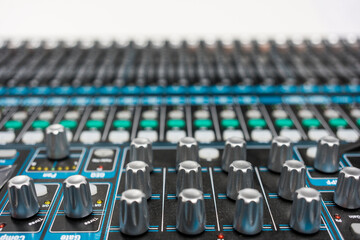 Close up of audio mixer console with control panel