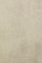 Neutral textured wall with a soft finish creating a calming atmosphere in a modern space
