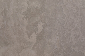 Naklejka premium Textured surface with unique patterns and colors resembling natural stone formation