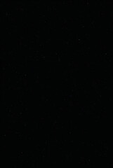 Fototapeta premium Black and white grunge film strip background with abstract starry space effect