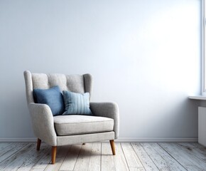 A light-gray wingback chair with blue throw pillows sits in a minimalist room, featuring a light-gray wall, wooden floor, and natural light.