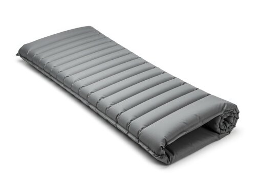 an inflatable sleeping pad gray