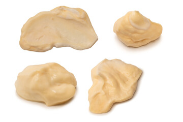 White sauce splashes isolated on white background.