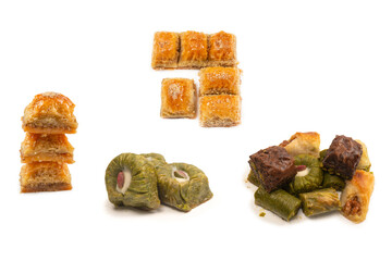 Turkish pistachio baklava isolated on a white background. A variety of turkish sweet baklava.