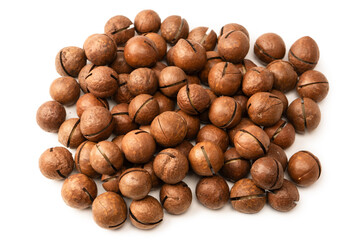 Macadamia nuts in a shell isolated on a white background.