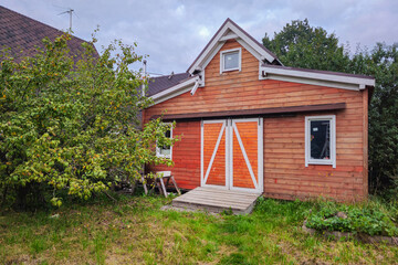 Closed wooden barn, country house.