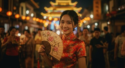 Obraz premium Woman in red dress with fan at night market